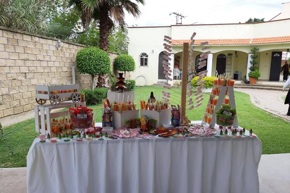 Mesa de dulces incluida