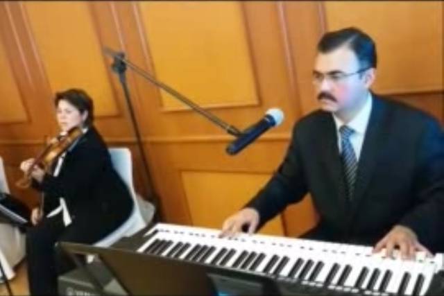 Dueto de violines con piano