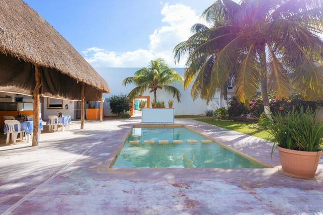 Palapa y alberca