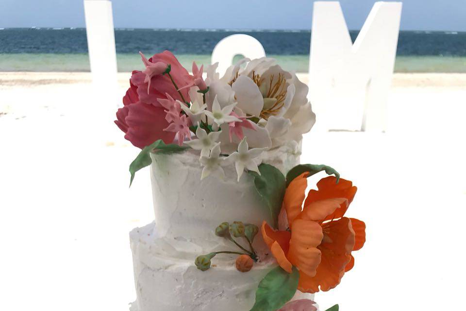 Pastel y flores de fondant