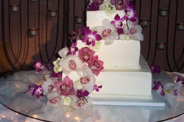 Pastel con orquideas