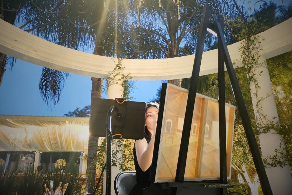 Artista pintando en vivo
