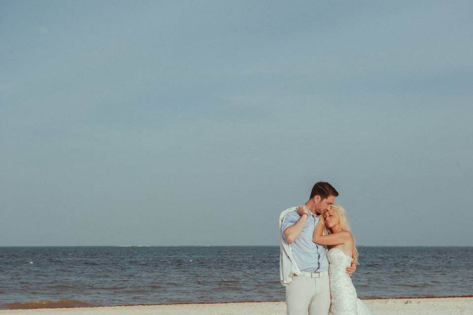 Bride and groom at beach