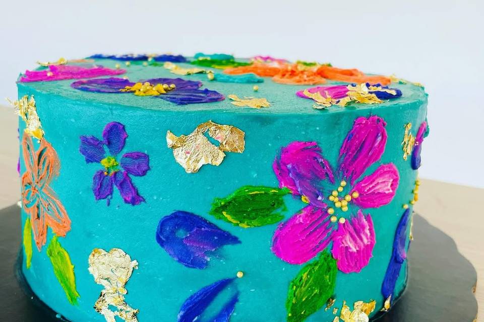Pastel con flores de colores
