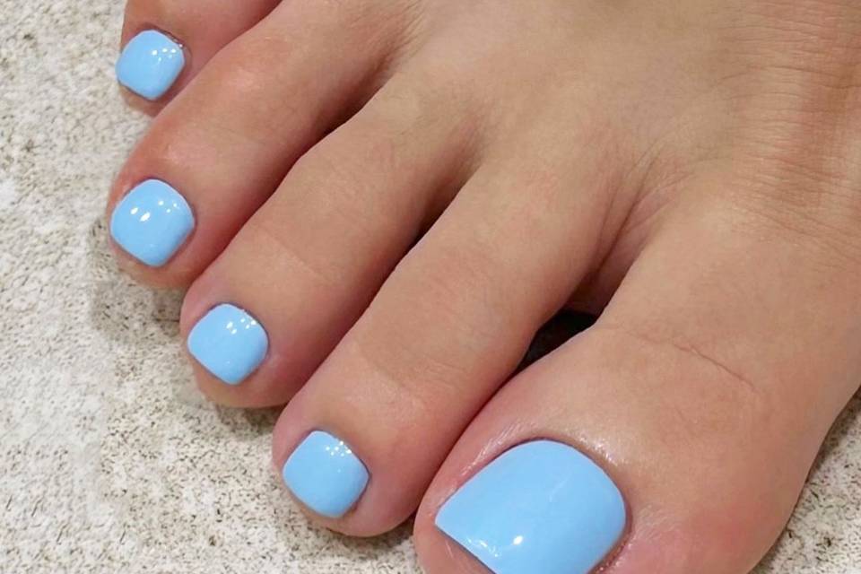 Uñas de los pies azules