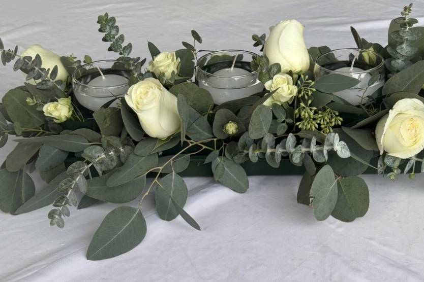 Jardinera con velas