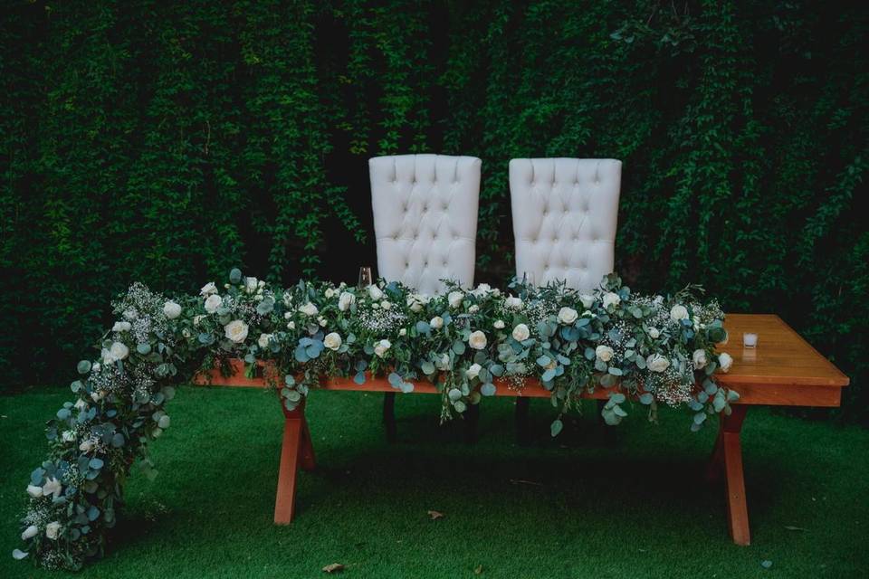 Arreglo de mesa de novios