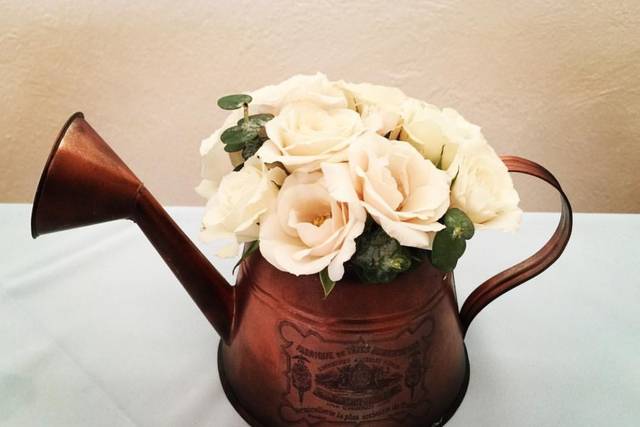 Regadera con mini rosas