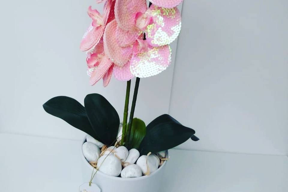 Orquídea rosa con lentejuelas